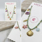 Gold Alloy Beach Multi Charm Braided Cord Necklace